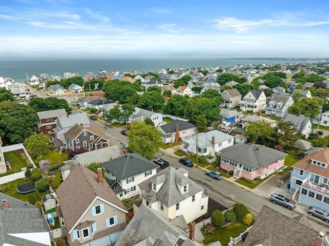 birds eye view of property featuring a residential view and a water view