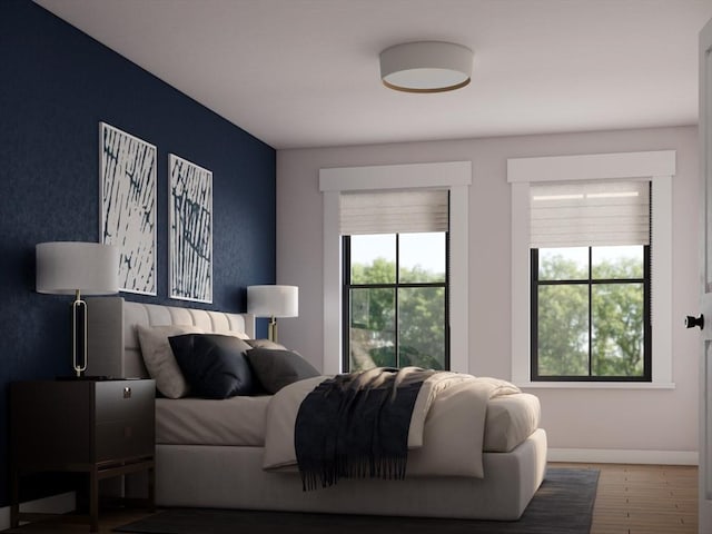 bedroom featuring hardwood / wood-style flooring