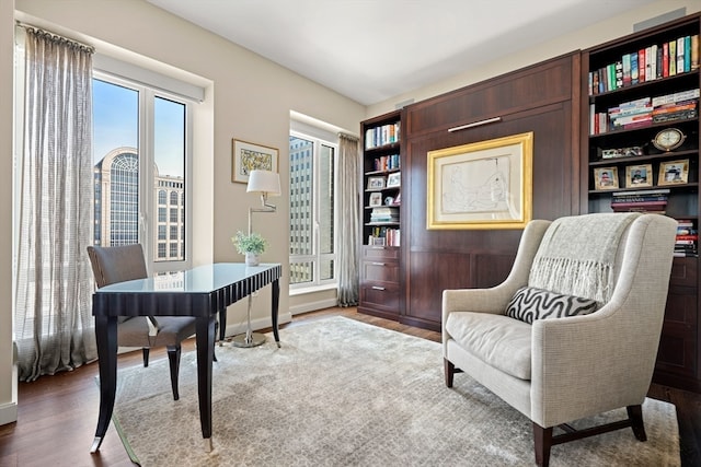 sitting room featuring hardwood / wood-style floors