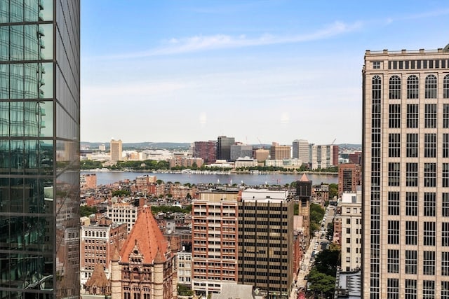 property's view of city with a water view