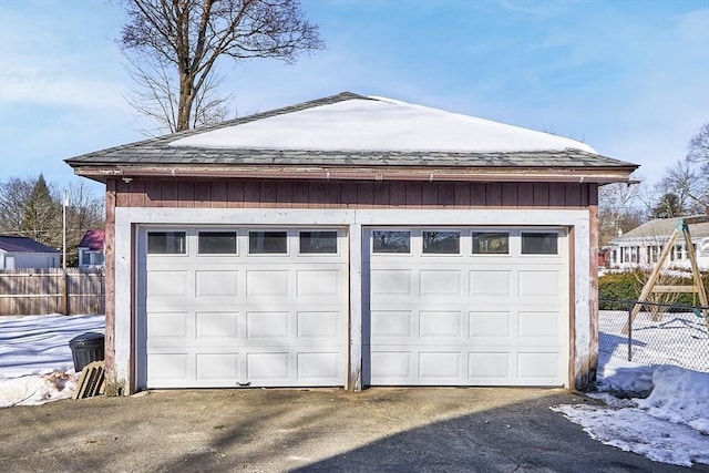 detached garage with fence