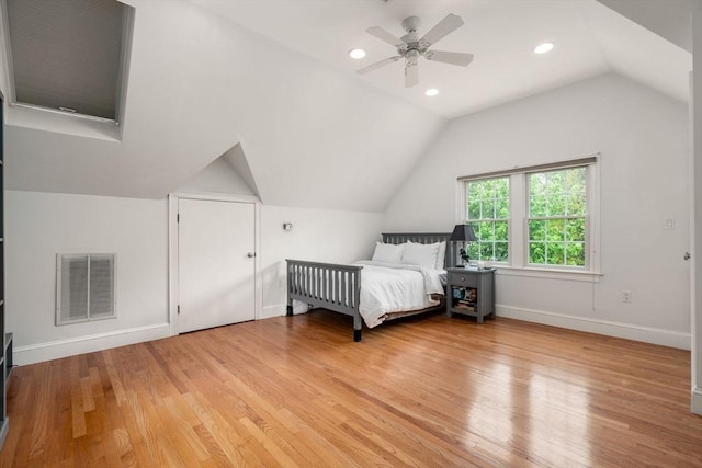 bedroom featuring vaulted ceiling, light wood finished floors, baseboards, recessed lighting, and ceiling fan