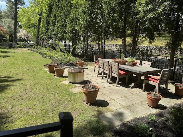 view of patio featuring outdoor dining area