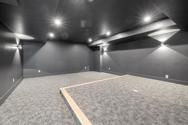 carpeted cinema room with recessed lighting and baseboards