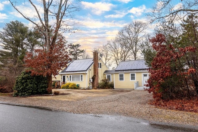 view of front of house featuring solar panels