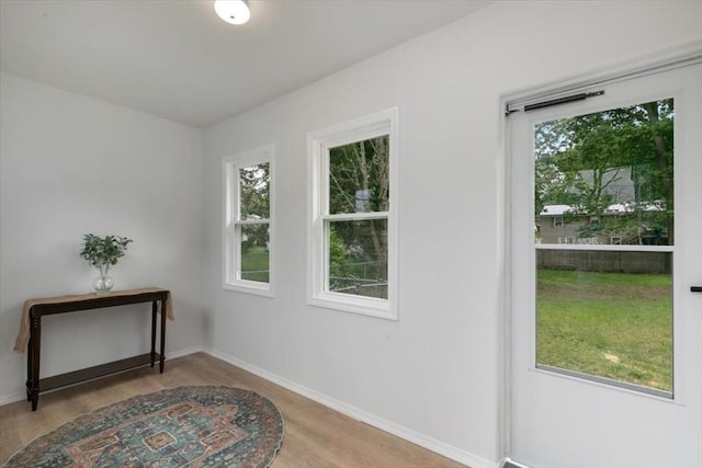 691 Beacon St, Lowell, MA 01850 - doorway with wood finished floors
