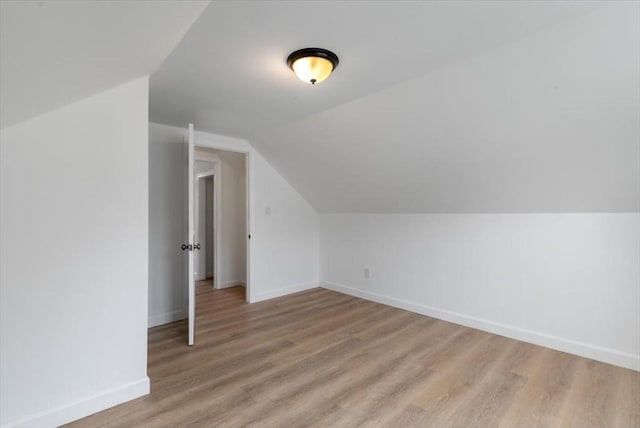691 Beacon St, Lowell, MA 01850 - bonus room with light wood-style flooring and lofted ceiling