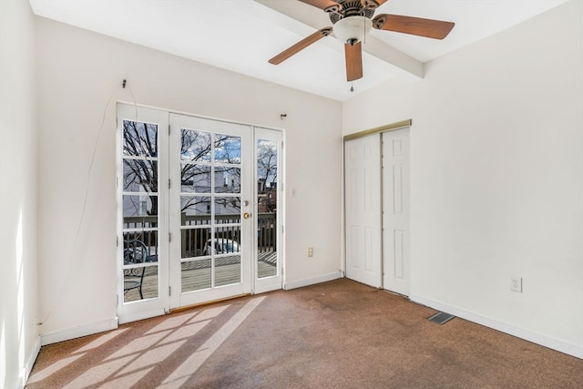 carpeted empty room with ceiling fan