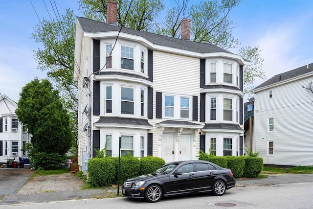 48-50 Portland St, Haverhill, MA 01830 - view of front of home with a chimney
