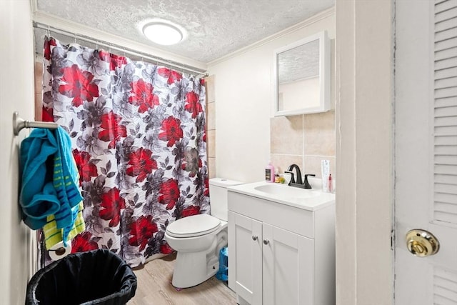 48-50 Portland St, Haverhill, MA 01830 - bathroom with vanity, crown molding, a textured ceiling, wood finished floors, and a shower with shower curtain
