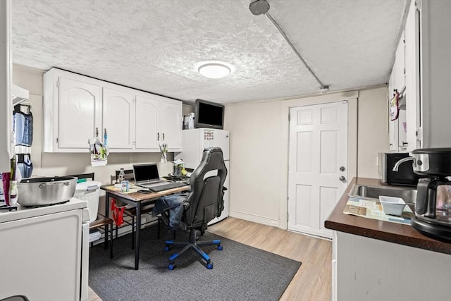48-50 Portland St, Haverhill, MA 01830 - office featuring a sink and light wood finished floors