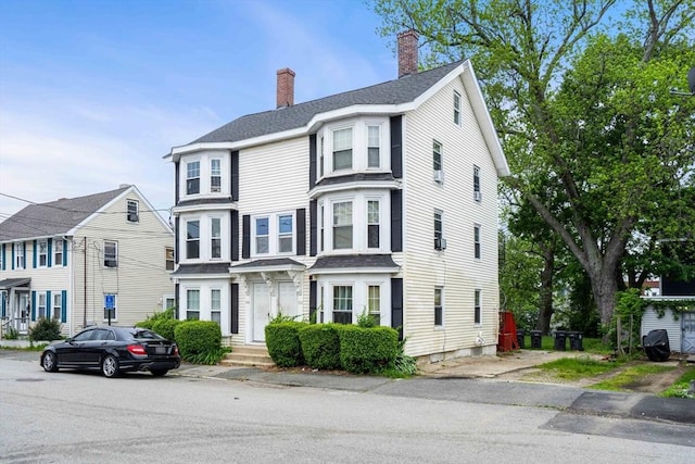 48-50 Portland St, Haverhill, MA 01830 - view of front of house featuring a chimney