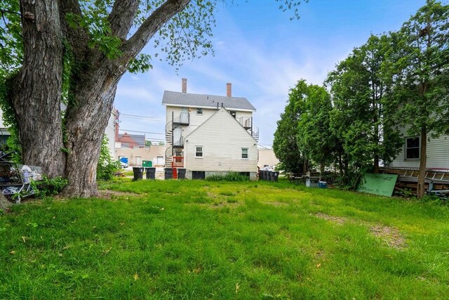 48-50 Portland St, Haverhill, MA 01830 - back of property with a chimney