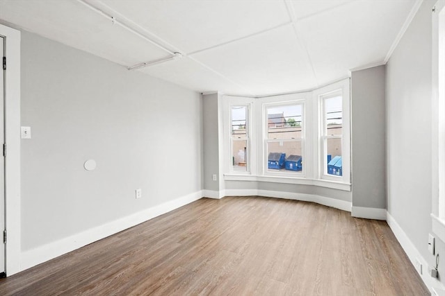 48-50 Portland St, Haverhill, MA 01830 - empty room with wood finished floors and baseboards