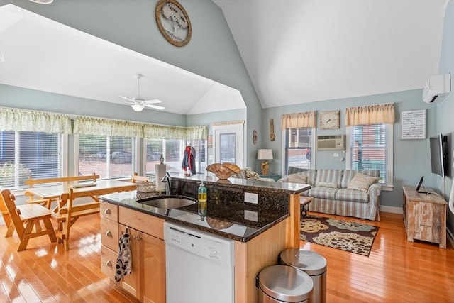 5 Lazy Day Dr Unit 5, Westford, MA 01886 - kitchen with a sink, light wood-style floors, a kitchen island with sink, dishwasher, and dark stone countertops