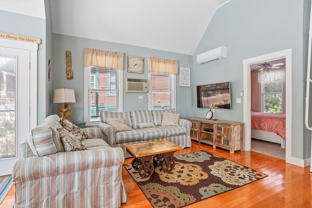 5 Lazy Day Dr Unit 5, Westford, MA 01886 - living room featuring an AC wall unit, a healthy amount of sunlight, wood finished floors, and a wall mounted air conditioner