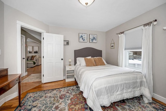 bedroom featuring wood-type flooring