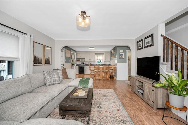 living room featuring light wood-type flooring