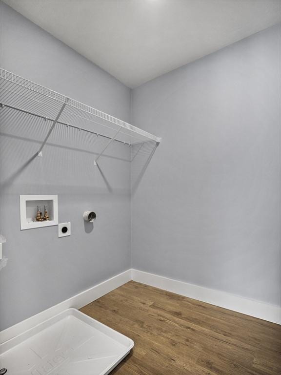 laundry room featuring washer hookup, hardwood / wood-style floors, and hookup for an electric dryer