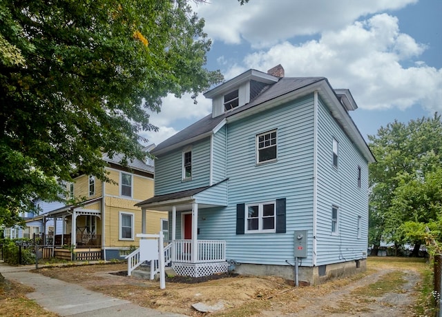 view of front of property featuring covered porch