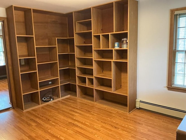 closet with a baseboard radiator