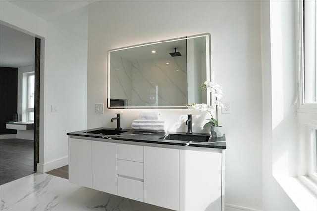 29 Woodford St Unit 2, Boston, MA 02125 - bar with a sink, baseboards, and marble finish floors