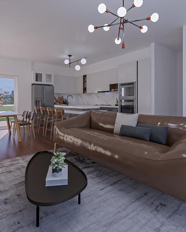 29 Woodford St Unit 2, Boston, MA 02125 - living room featuring wood finished floors and a chandelier