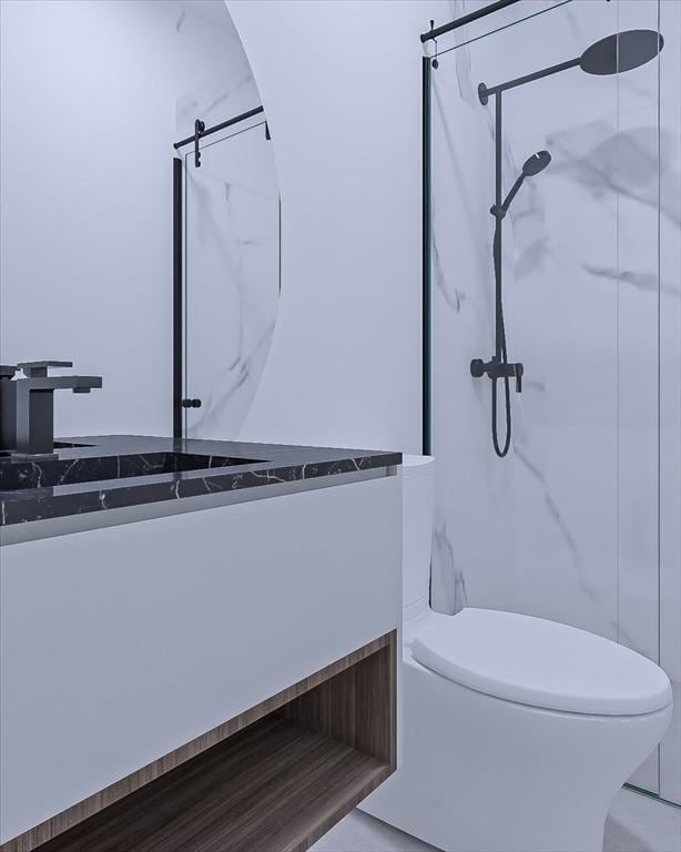 29 Woodford St Unit 2, Boston, MA 02125 - full bathroom featuring a marble finish shower and toilet