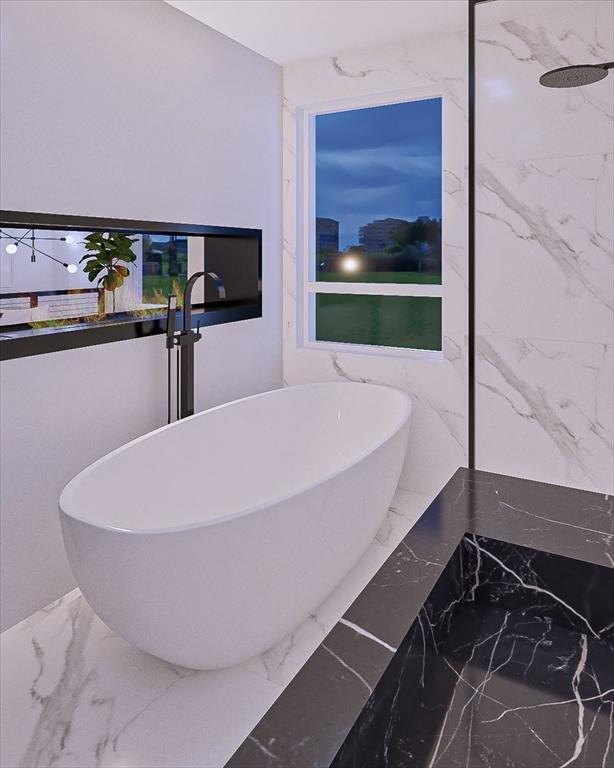 29 Woodford St Unit 2, Boston, MA 02125 - bathroom featuring marble tiled flooring and a freestanding bath
