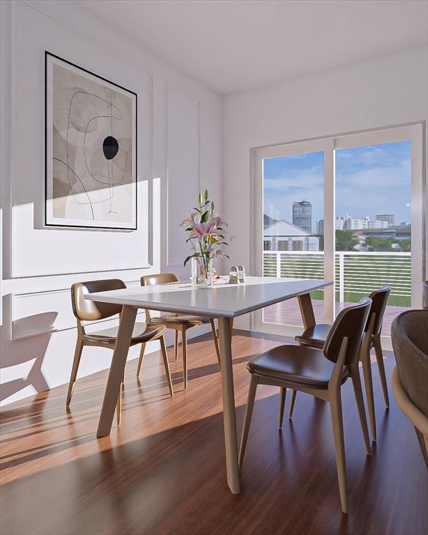 29 Woodford St Unit 2, Boston, MA 02125 - dining room featuring wood finished floors and a city view