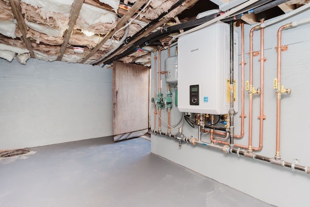 basement featuring tankless water heater