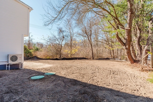 view of yard featuring ac unit