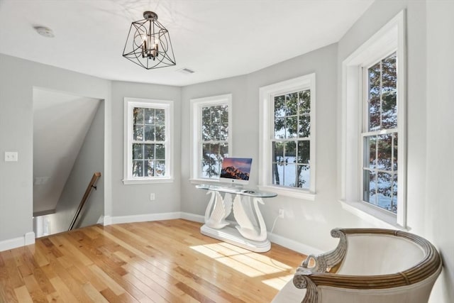 interior space with a wealth of natural light and visible vents