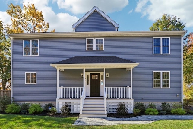 view of front facade featuring a porch and a front lawn