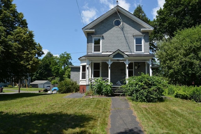 19 Noble Ave, Westfield, MA 01085 - view of front of home with covered porch and a front yard