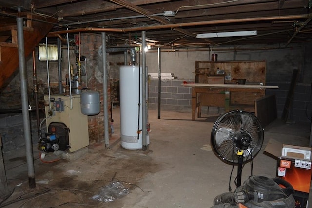 19 Noble Ave, Westfield, MA 01085 - unfinished below grade area with gas water heater and a heating unit