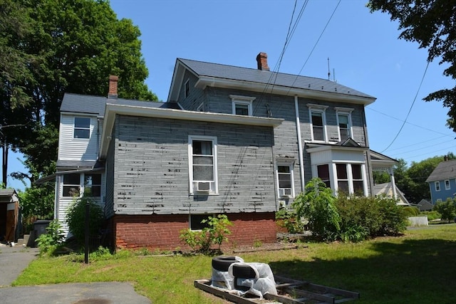 19 Noble Ave, Westfield, MA 01085 - back of house featuring a lawn and a chimney