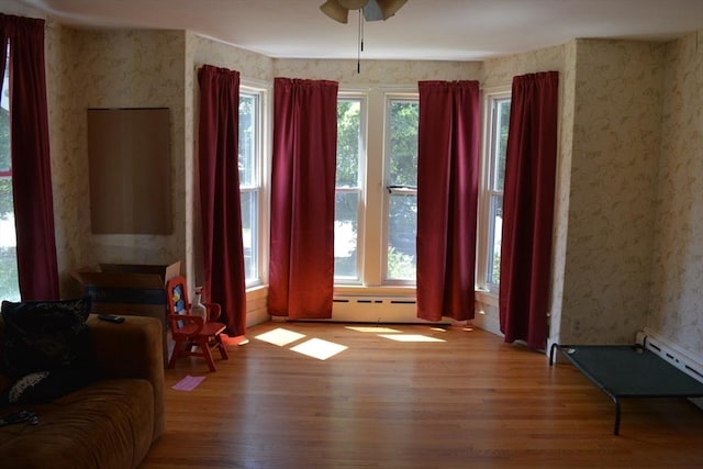19 Noble Ave, Westfield, MA 01085 - living room featuring light wood-type flooring, wallpapered walls, and a ceiling fan