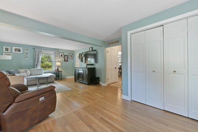 1026 Chandler St, Tewksbury, MA 01876 - living area featuring light wood finished floors and baseboards