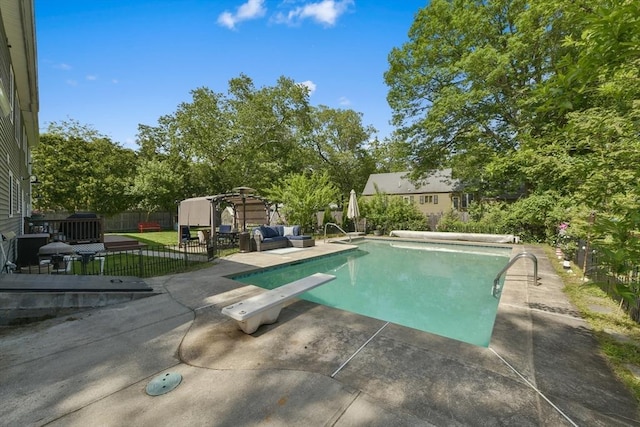 1026 Chandler St, Tewksbury, MA 01876 - view of swimming pool with a patio, outdoor lounge area, a fenced backyard, and a diving board