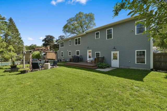 1026 Chandler St, Tewksbury, MA 01876 - rear view of house with a wooden deck and an outdoor living space