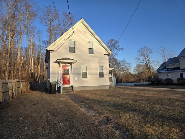 rear view of house with cooling unit