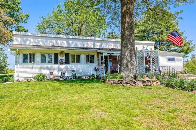 8 High St, Granby, MA 01033 - view of front of home featuring a front lawn
