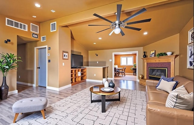 8 High St, Granby, MA 01033 - living room with light wood-style flooring, a ceiling fan, baseboards, recessed lighting, and high vaulted ceiling