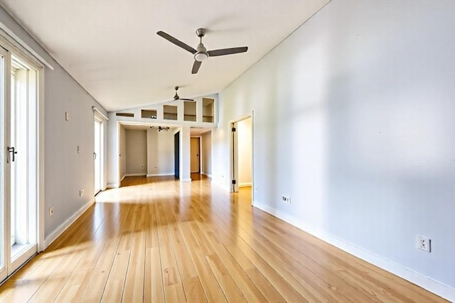 8 High St, Granby, MA 01033 - unfurnished room featuring ceiling fan, vaulted ceiling, light wood finished floors, and baseboards
