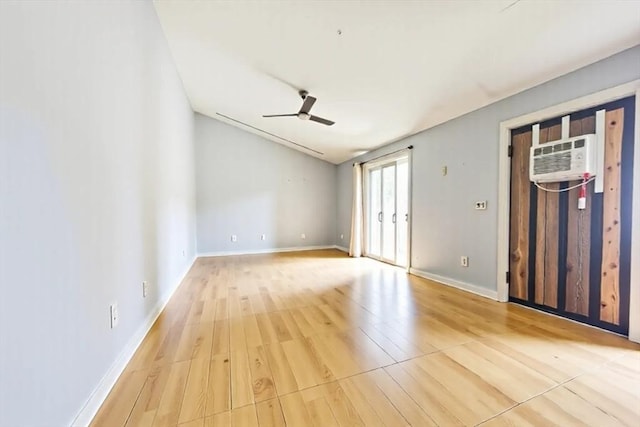 8 High St, Granby, MA 01033 - unfurnished room with an AC wall unit, light wood finished floors, lofted ceiling, ceiling fan, and baseboards