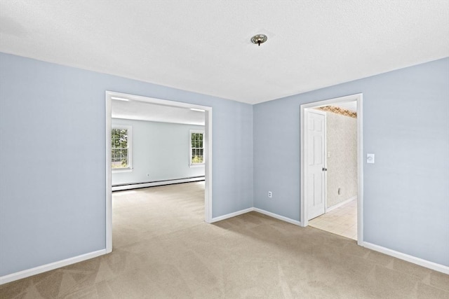 91 Observatory Waye, Marshfield, MA 02050 - unfurnished room with a baseboard heating unit, carpet, and baseboards