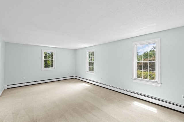 91 Observatory Waye, Marshfield, MA 02050 - carpeted empty room with a baseboard radiator and a textured ceiling