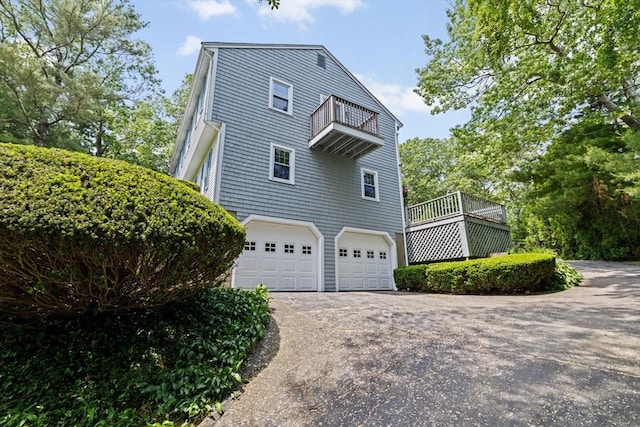 91 Observatory Waye, Marshfield, MA 02050 - view of property exterior with a balcony, driveway, and an attached garage