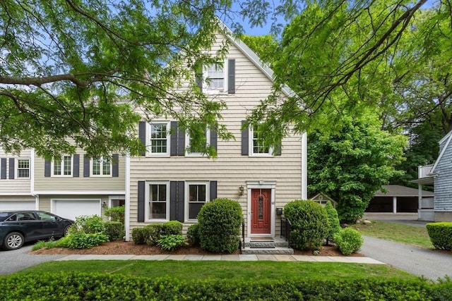 68 Linden St Unit 68, Wellesley, MA 02482 - view of front of property with an attached garage and a front yard